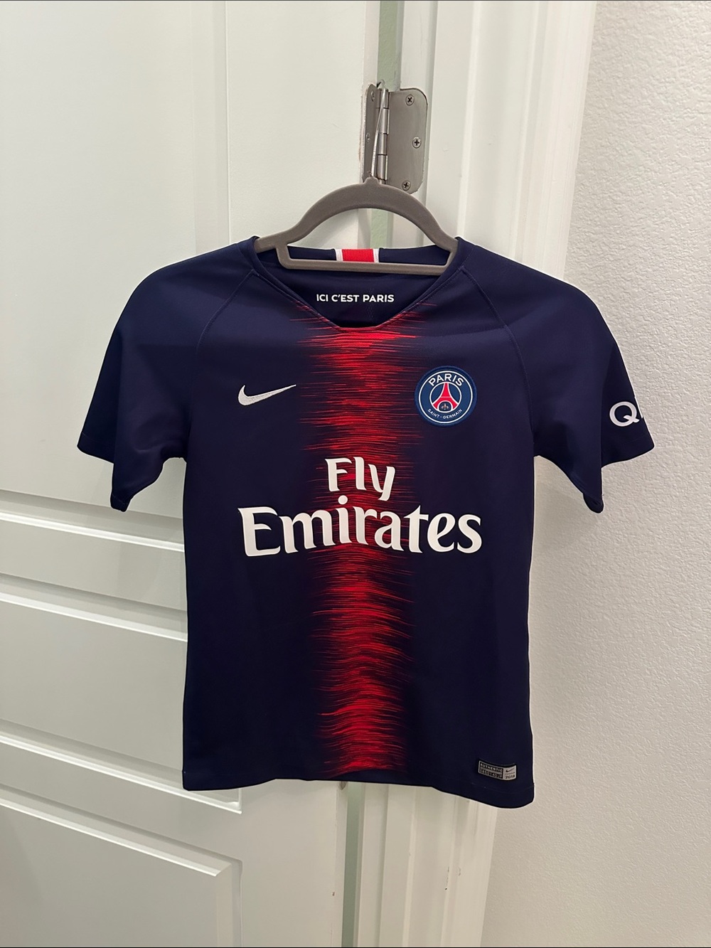 Nike Kids Navy Jersey with Red Center Stripe - PSG Fly Emirates